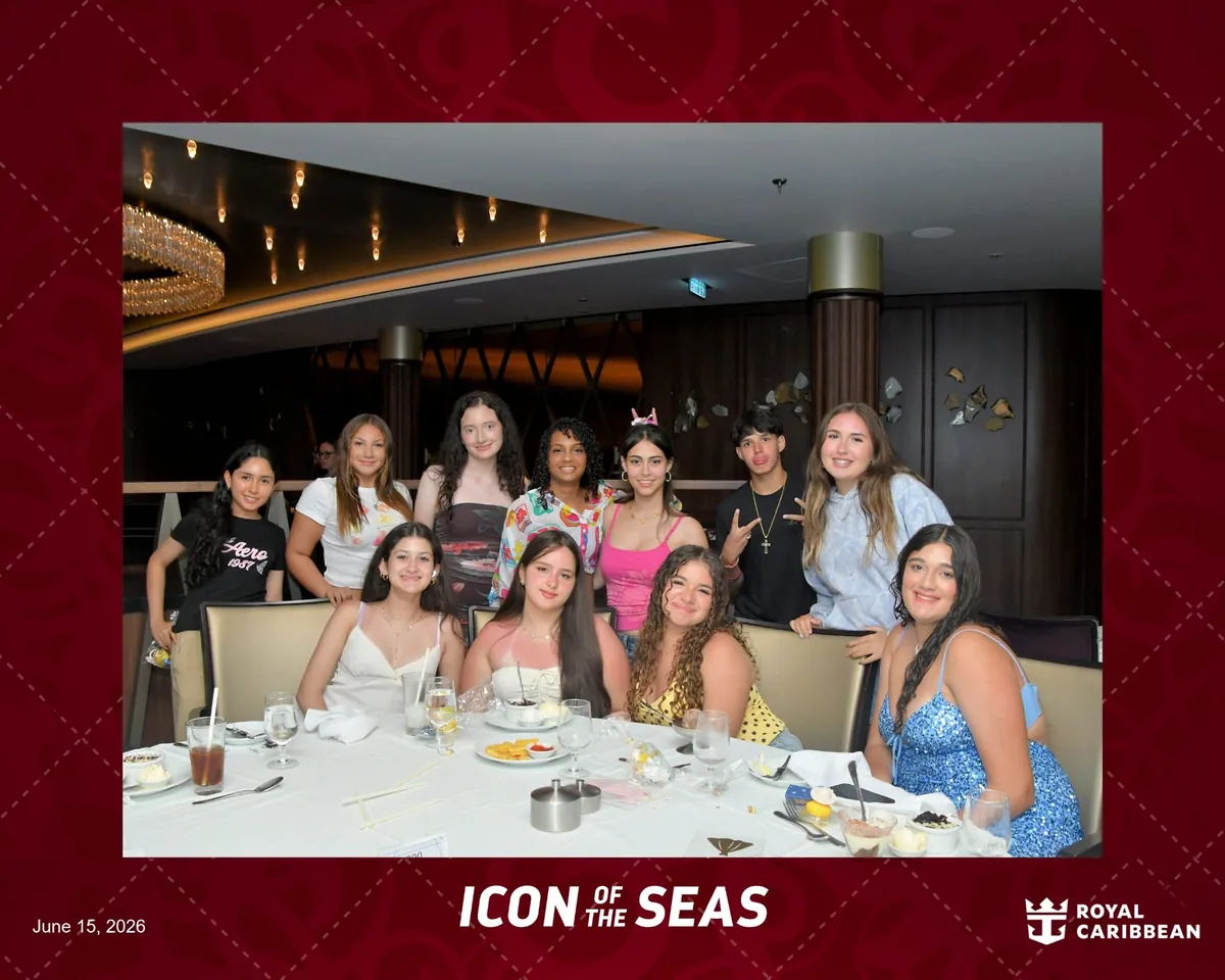 Guests gathered around a table on board