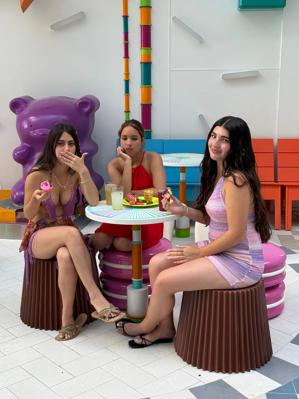 Friends spending time together in colorful seats on board