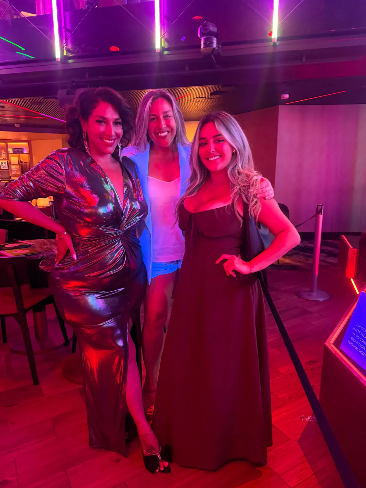 Guests celebrating together in formal evening dresses