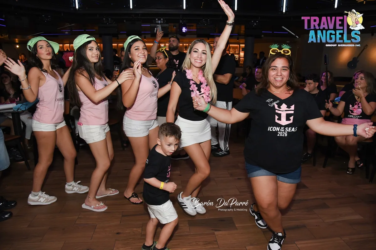 Guests dancing together at a Travel Angels party